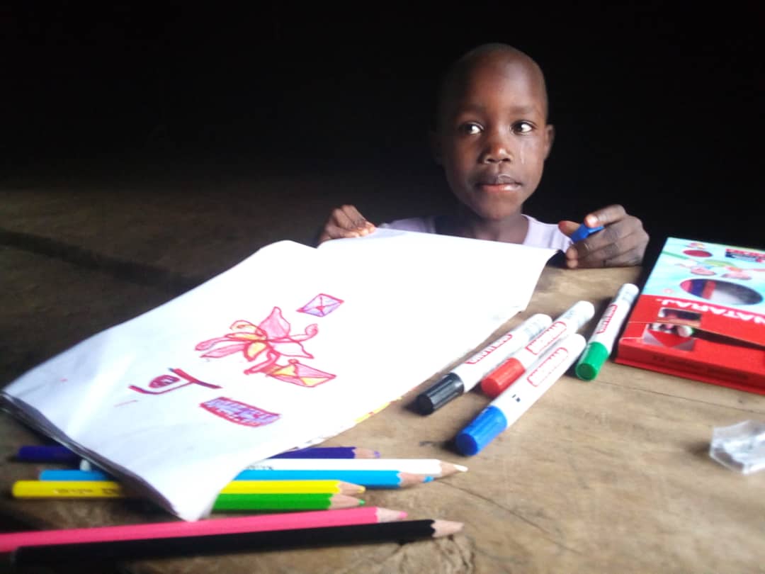 Photo: child with drawing